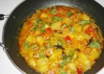 Cucumber and tomato curry